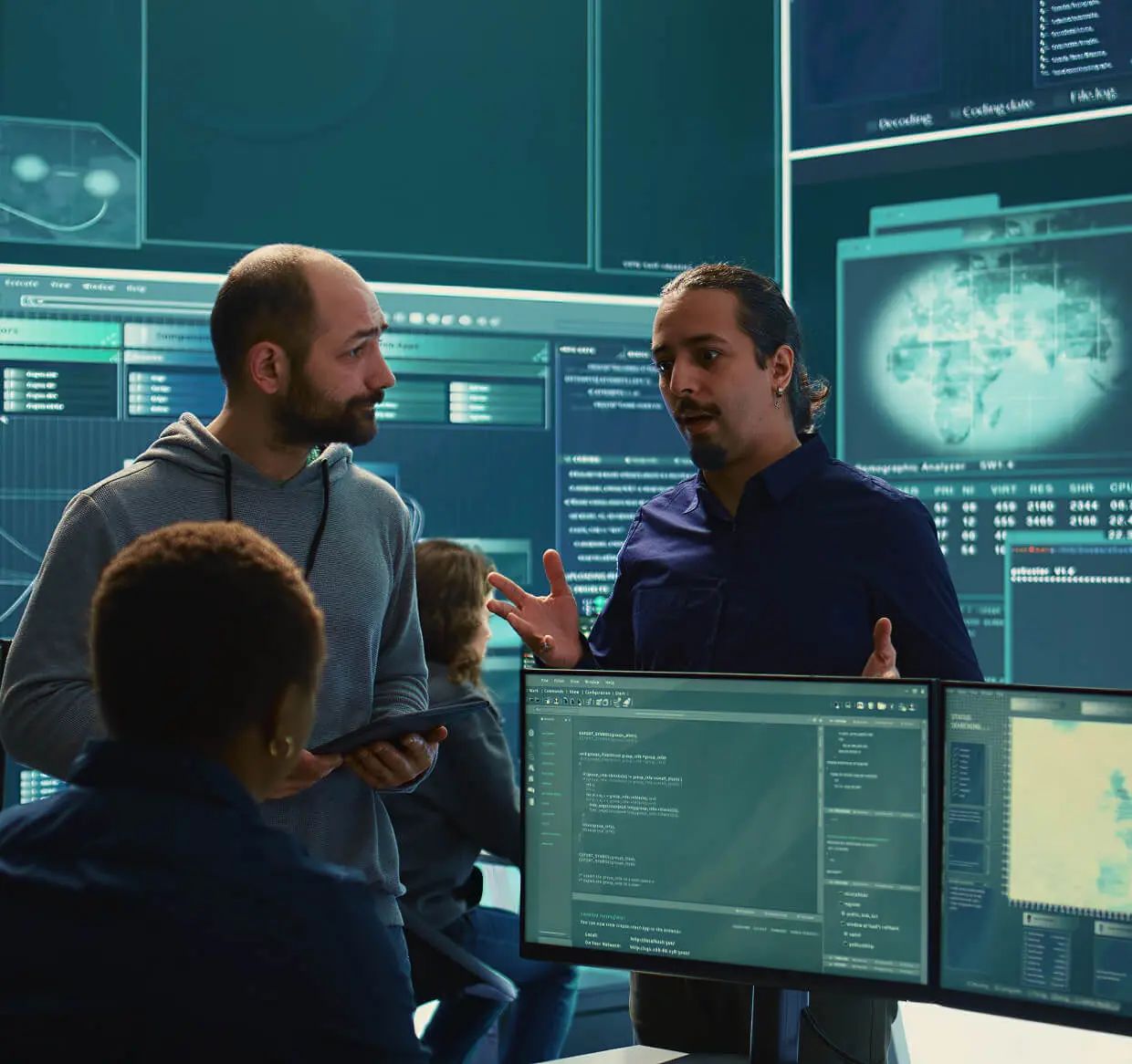 Team discussing in a high-tech office.