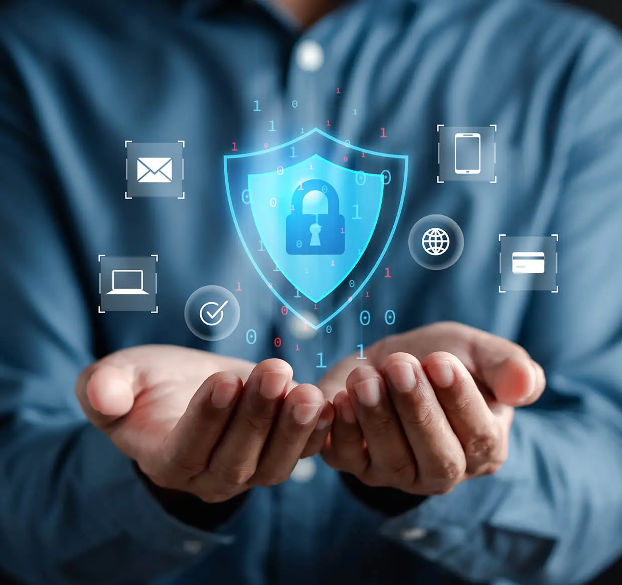 Hands displaying digital security shield hologram.