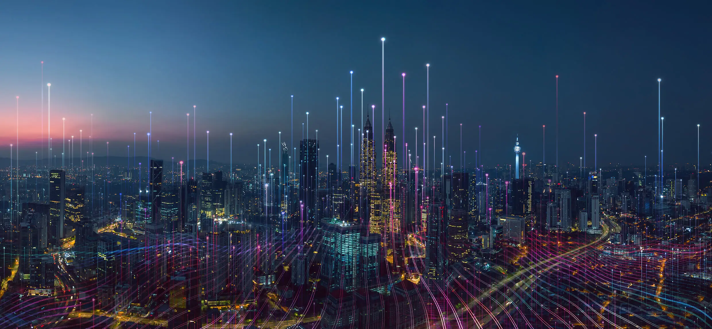 Futuristic cityscape with digital connectivity lights.