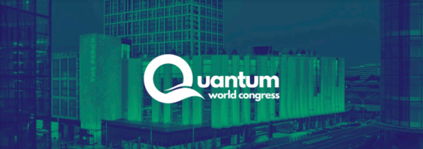 Logo of Quantum World Congress with cityscape background.